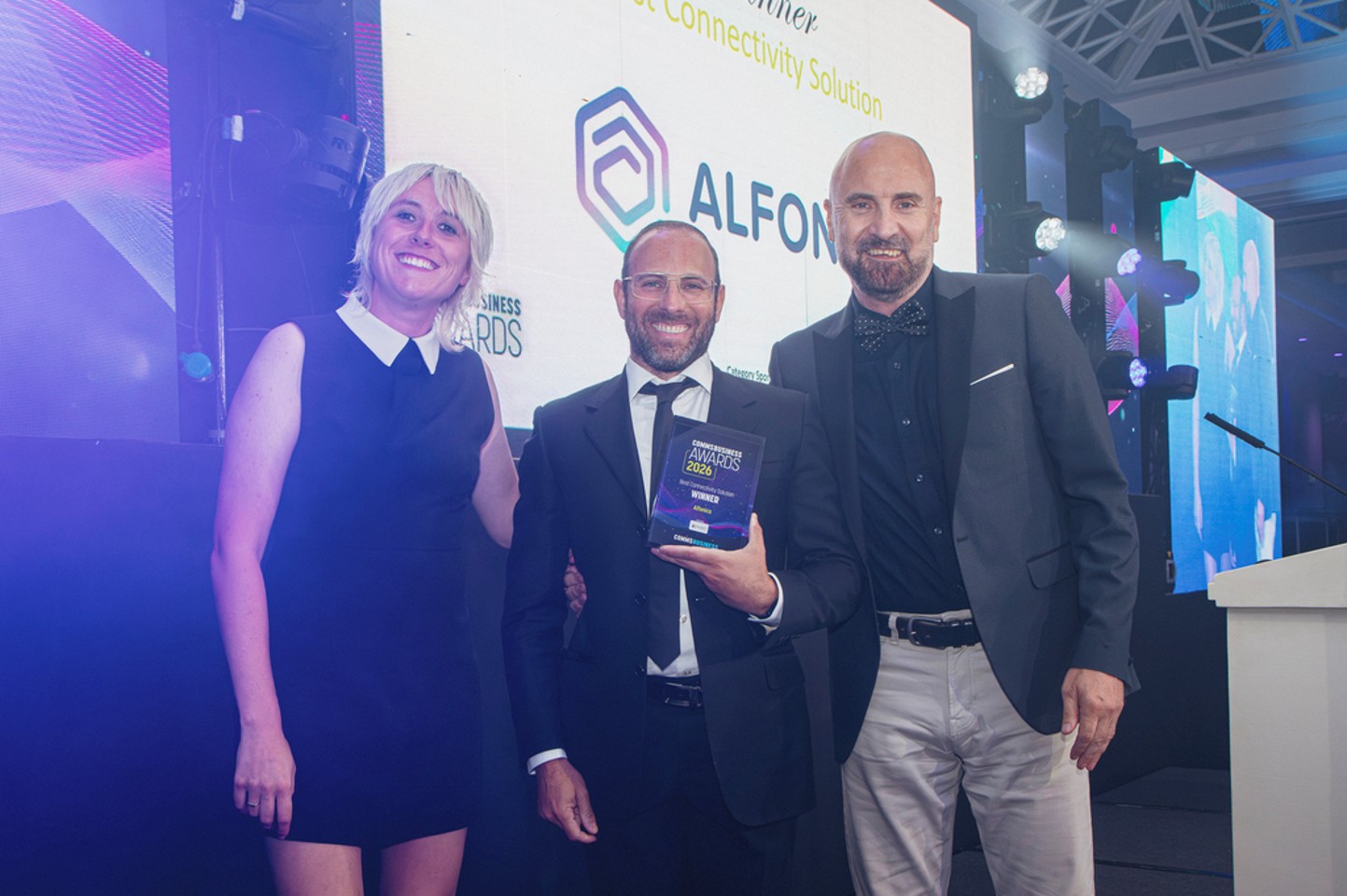 Alfonica team accepting the Best Connectivity Solution award at the Comms Business Awards 2026